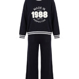 Damenpullover und Hose mit Kaschmiranteil