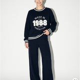 Damenpullover und Hose mit Kaschmiranteil