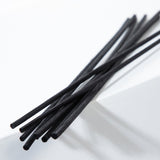 Schwarze Rattanstäbchen aus Naturrattan, 250 x 4 mm, 8 Stück.