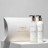 Pflegendes und feuchtigkeitsspendendes Körper-Gesichts-Hand-Set "Oud": Reiniger 250 ml + Creme 250 ml
